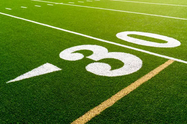 American football stadium 30 yard line background.