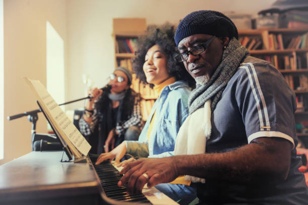 istock Band playing and singing at home 1051314350