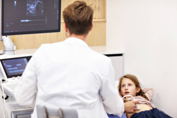 istock Doctor testing young girl with usg 1051316846