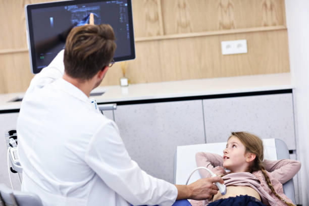 istock Doctor testing young girl with usg 1051317376