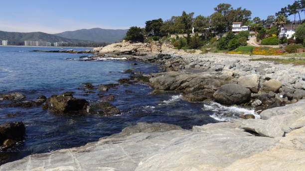 istock Landscape of rock formations and rocky beach 1051323948