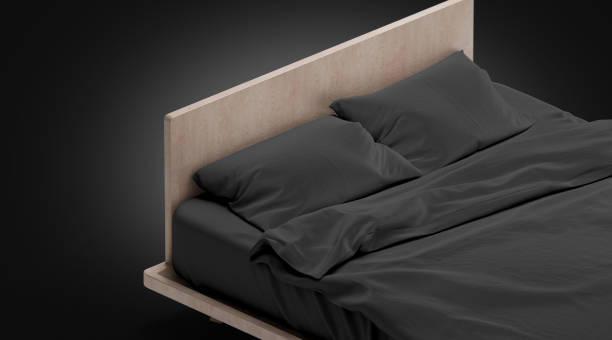 istock Blank black bed with pillows mock ups, isolated 1051332794