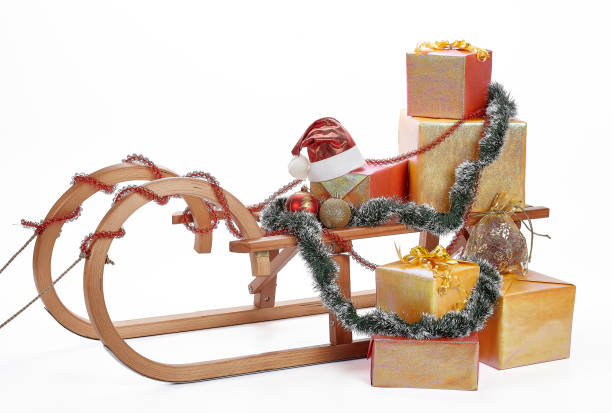 istock Wooden sledge with Christmas gifts. 1051333788