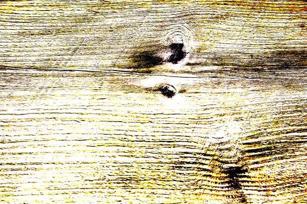 istock Colored high contrast wooden texture in yellow tones 1051337600