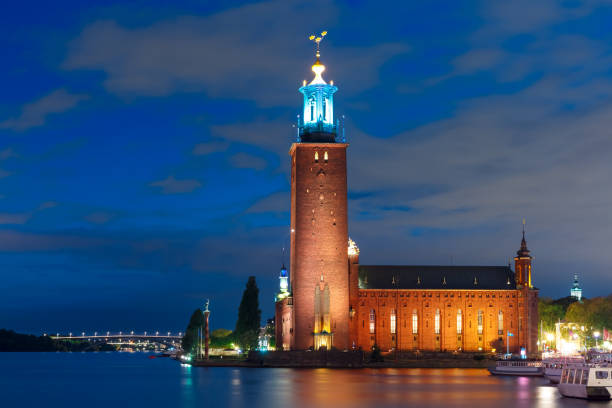 Stockholm City Hall at night, Stockholm, Sweden Stockholm City Hall or Stadshuset at night in the Old Town in Stockholm, capital of Sweden kungsholmen town hall photos stock pictures, royalty-free photos & images