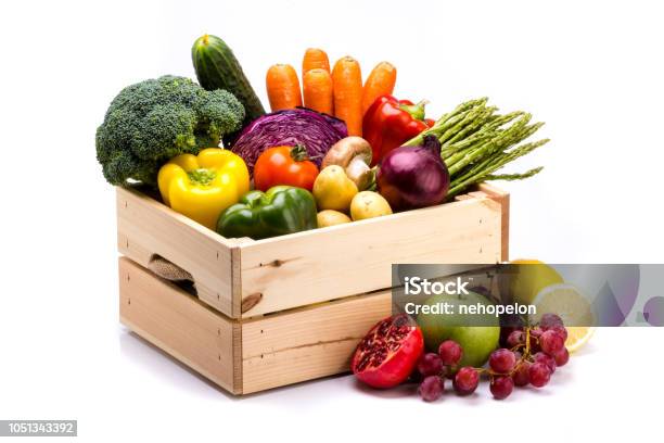 Pine Box Full Of Colorful Fresh Vegetables And Fruits On A White Background Stock Photo - Download Image Now