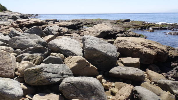 istock Landscape of rock formations and rocky beach 1051346116