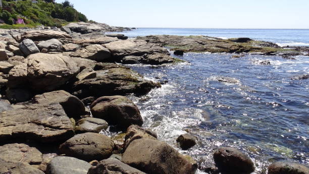 istock Landscape of rock formations and rocky beach 1051346146