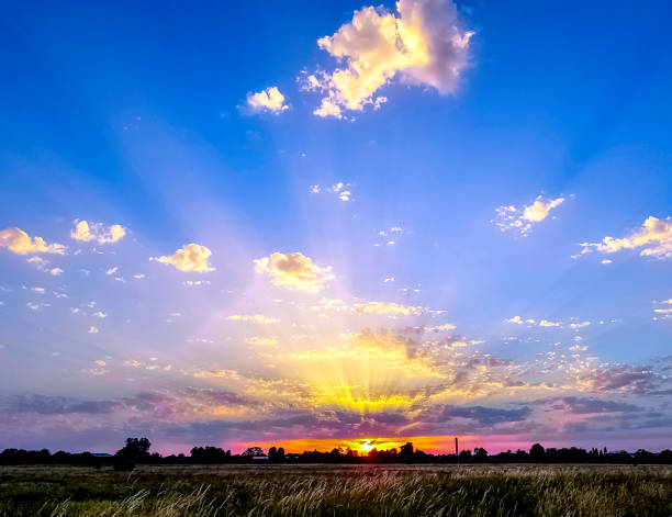 istock Sunset over Polish fields in Choczewo, Pomerania, Poland. 1051346258