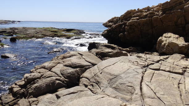 istock Landscape of rock formations and rocky beach 1051346296