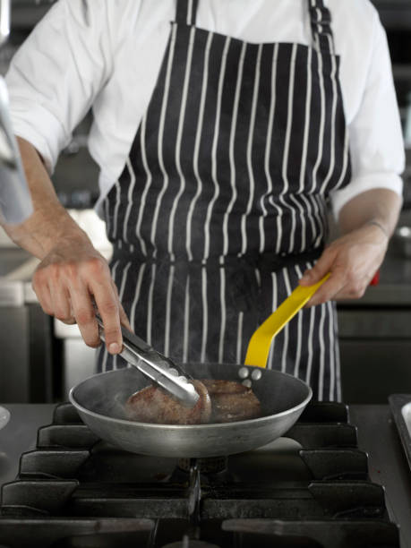 chef cooking steak