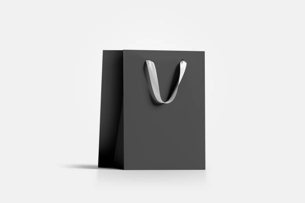 Blank black paper gift bag with white silk handle mockup,
