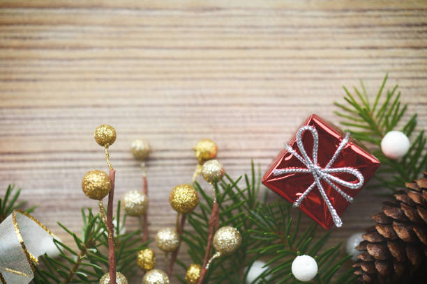 istock Wooden background with Christmas tree 1051353652