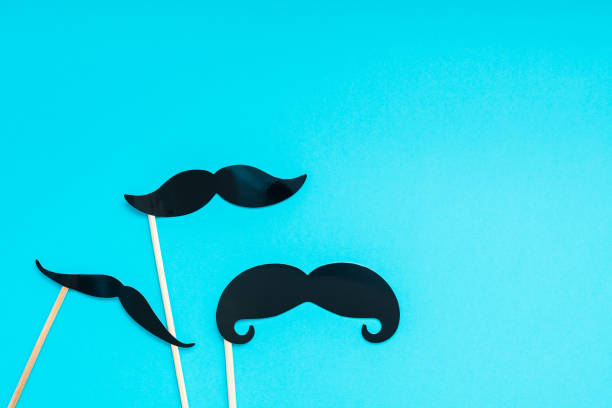 istock Paper moustaches for men fathers dad concept 1051357102