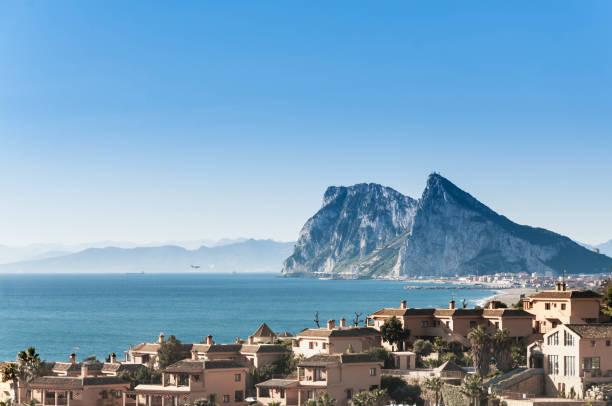 Beach and golf field in La Alcaidesa, Costa del Sol, Spain with Gibraltar in the horizon Beach and golf field in La Alcaidesa, Costa del Sol, Spain with Gibraltar in the horizon gibraltar photos stock pictures, royalty-free photos & images