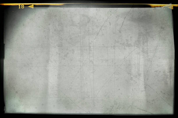 Blank grained and scratched film strip texture background