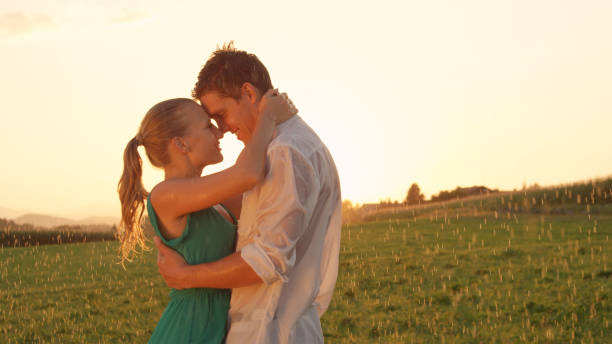 istock CLOSE UP: Young lovers having fun dancing outdoors in the pleasant spring rain. 1051371750