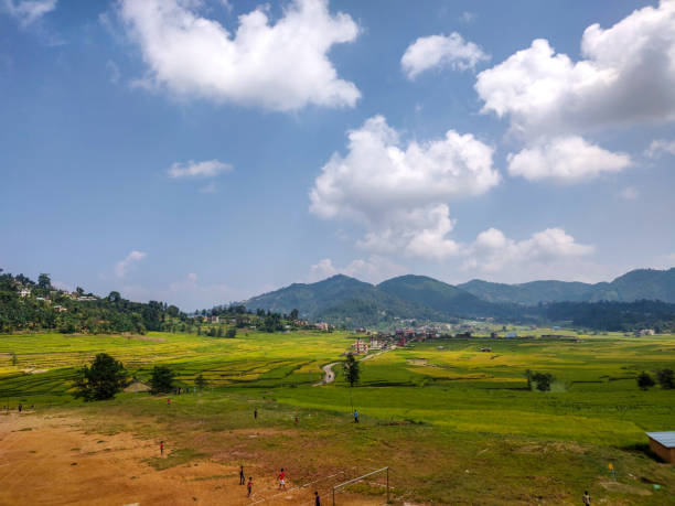istock Landscape and children playing football 1051372004