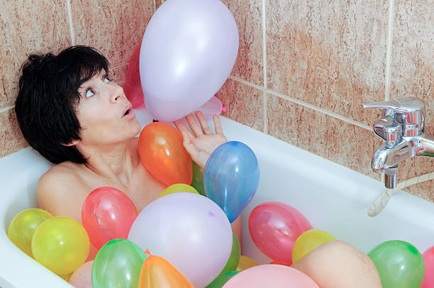 istock Surprise in the bathroom with balloons 105137383
