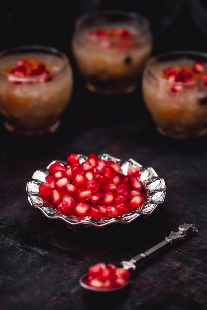 istock Pomegranate Seeds in Metal Bowl 1051377036