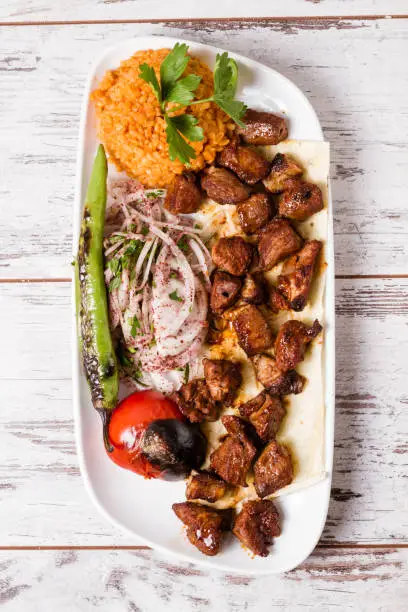 Authentic Turkish shish kebab in white plate