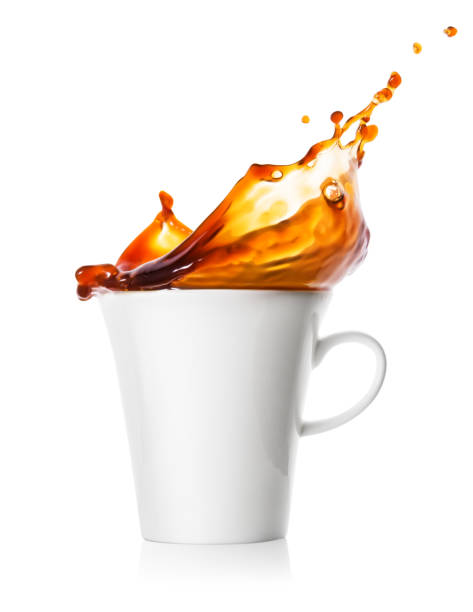 istock Spray and splash of coffee in cup 1051379584