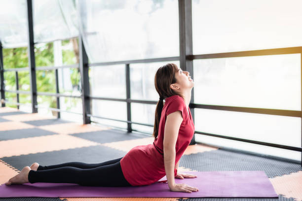 istock Woman Doing Yoga Under Covered Bridge 1051379876