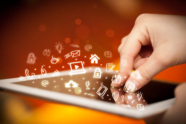 istock Finger pointing on tablet pc, social media concept 1051381654