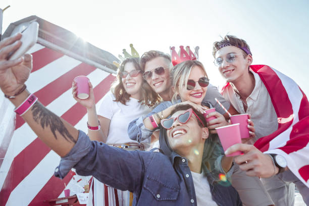 istock Handsome man enjoying communication with his friends 1051385008