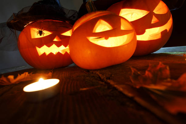 istock Halloween pumpkin with witches hat 1051390180