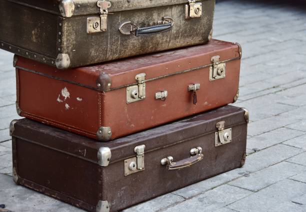 istock Stack Of Luggage On Street 1051390872
