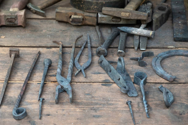 istock Set of ancient tools for metal forging. 1051391086