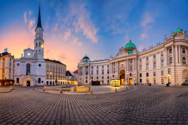 Vienna, Austria. Cityscape image of Vienna, Austria with St. Michael's Square during sunrise. historic building photos stock pictures, royalty-free photos & images