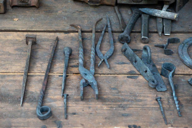 istock Set of ancient tools for metal forging. 1051391452
