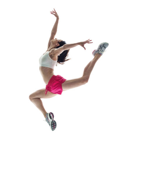 istock Beautiful athletic woman jumping sideways with head up 1051394870