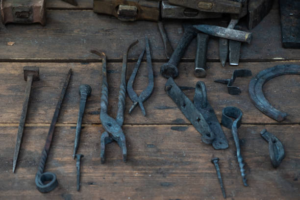 istock Set of ancient tools for metal forging. 1051395090