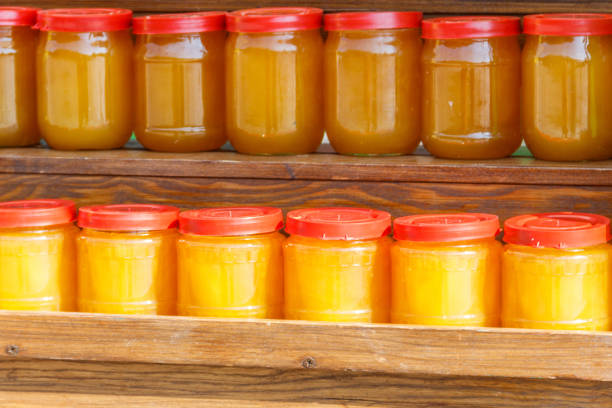 istock Jars of different honey varieties on a shelf 1051398046