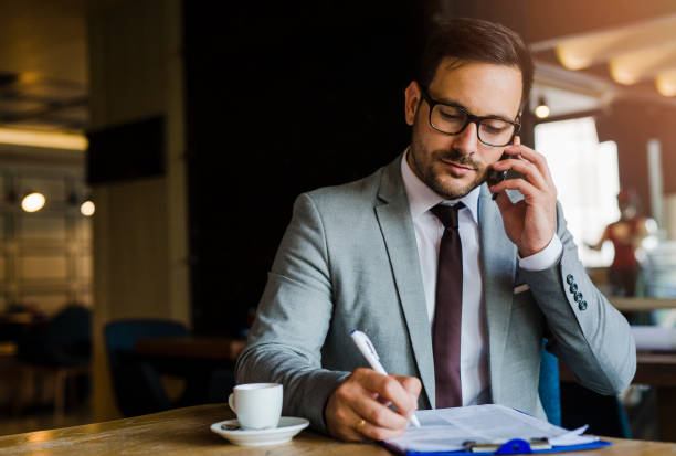 istock Businessman working at coffee shop 1051402262