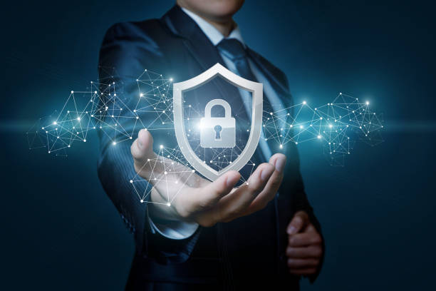 Protection network security computer in the hands of a businessman . Protection network security computer in the hands of a businessman on a blue background. antivirus software stock pictures, royalty-free photos & images