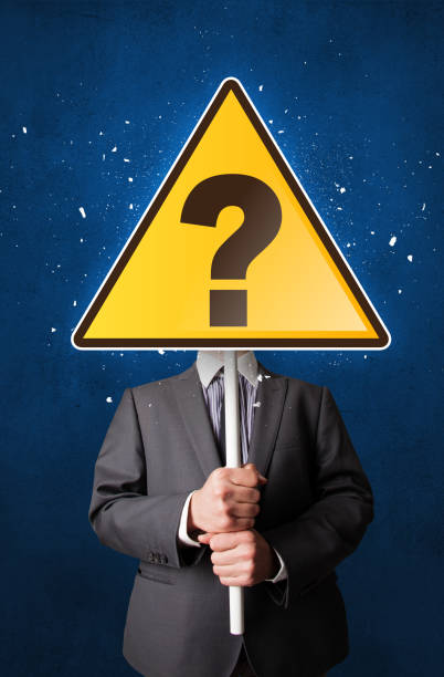 istock Businessman holding question sign 1051414254