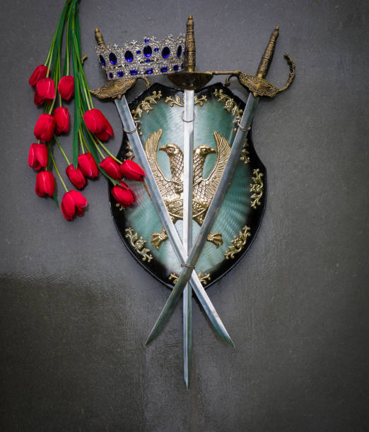 istock royal shield and crown on a gray background 1051424084