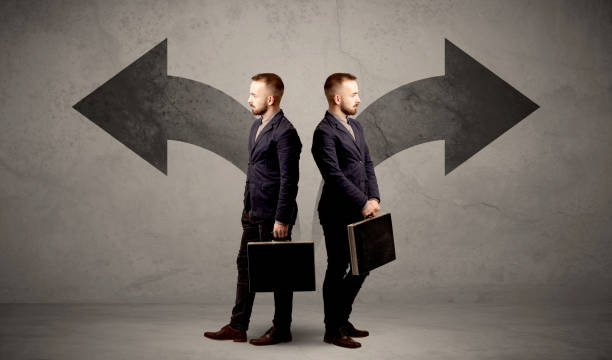 istock Businessman with two choices 1051424428