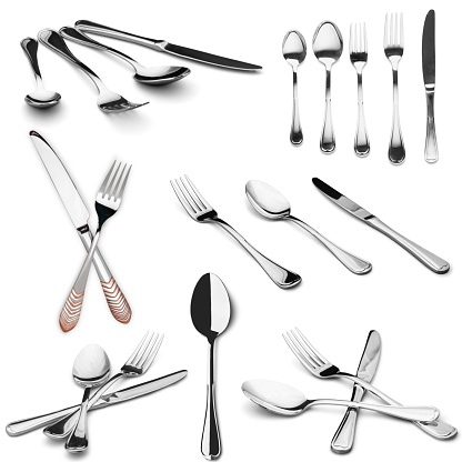Cutlery set with Forks, Knives and Spoons isolated on white background