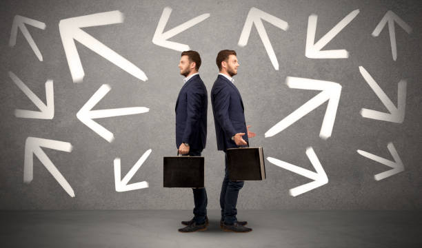 istock Businessman with two choices 1051424836