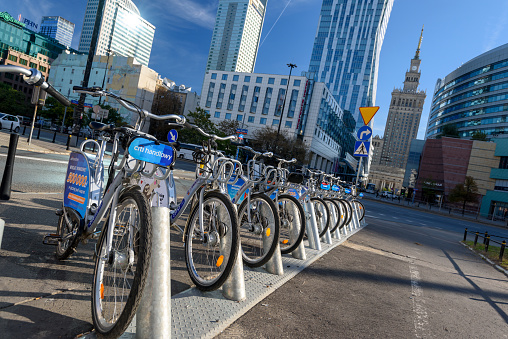 Warsaw, Poland - Sept 30, 2018: Bike stations near the Palace of Culture and Science in Warsaw by Veturilo company that offers in total 2968 bikes for rental.