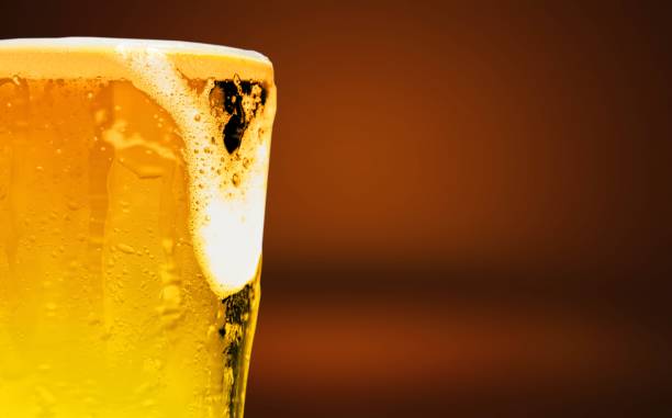 Bar. Glass of light beer on a dark jug photos stock pictures, royalty-free photos & images