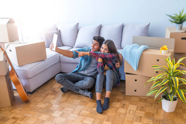 istock Young couple moving in a new home concept 1051431192