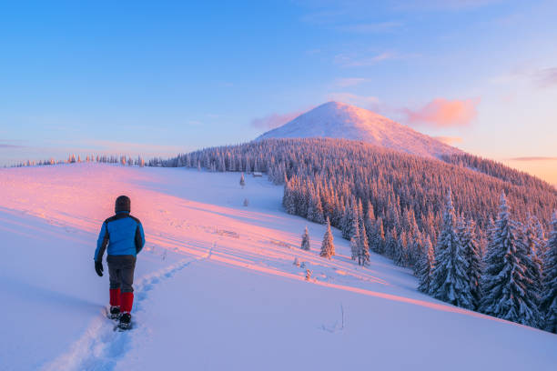 istock Walking in the winter mountains 1051432174