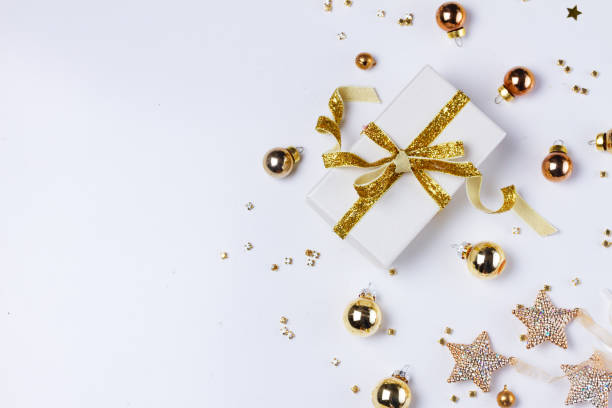 istock Christmas flat lay scene with golden decorations 1051434620