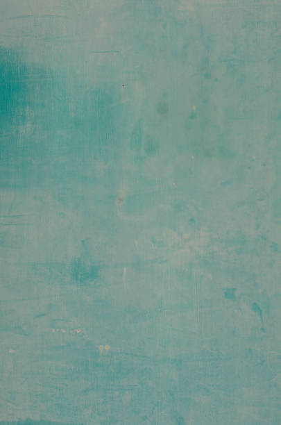 istock Faded aqua green paint on wood 1051435386